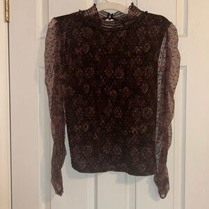 NWOT maroon long sleeve blouse with flowers and dot design.
